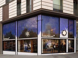 Montblanc store exterior with a modern design, featuring large windows and elegant branding.